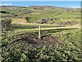 Footpath post on the slopes of Adstone Hill