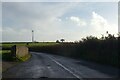 SW9844 : Wind turbine on hill south  of Tregondean Farm by David Smith