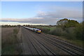 Class 66 diesel taking gravel down the Midland Main Line past Cossington