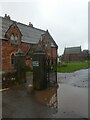 SX9393 : Flooded gateway of Exeter Cemetery by David Smith