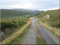 NC4543 : Minor road descending towards Strathmore River by Peter Wood