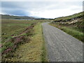 NC4550 : Strath More - Minor road approaching Loch Hope by Peter Wood