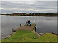 Pier outside The Pier restaurant, looking over Little Loch Shin