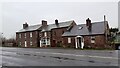 Houses at Bluebell Farm on west side of A6