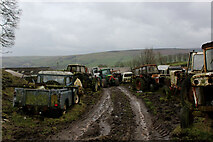 SD9845 : Tractors' Graveyard at Manor House Farm by Chris Heaton