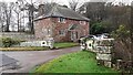 Holly Lodge at entrance to Dalston Hall Hotel on east side of B5299