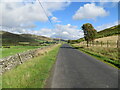 NT3024 : Road (B709) near to Eldinhope by Peter Wood