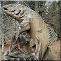 TQ3331 : Wood carving of a fish - Wakehurst Gardens by Ian Cunliffe