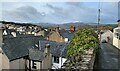 Snow capped Carneddau across the rooftops