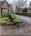 Wonky yellow sign alongside the B4233 near Hendre