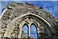 Creake Abbey: Site of the nave and pulpitum, later c13th and c15th work under the arch