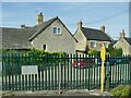 Blocked level crossing at Tackley station