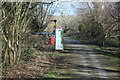 Information board and signpost at Harper