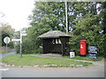 At the junction of Manor Road and Holy Well Road