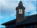 Clock on a building on Claypit Lane