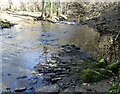 Remains of old road across the burn