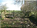 NY2434 : Gate on The Cumbria Way near Orthwaite by Adrian Taylor