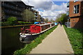 TQ0680 : Canal boat Justus 111,  Grand Union Canal by Ian S