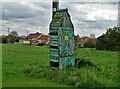 Strange old hut below power lines at Sutton