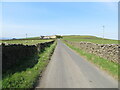 A wall enclosed Warley Wise Lane approaching Black Lane Ends