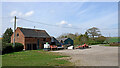 SO8496 : Barn and sheds by Furnace Grange Farm near Trescott by Roger  Kidd