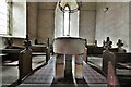 Wordwell, All Saints Church: Norman font on unusual three-legged support