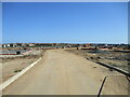 Road  into  new  housing  estate  being  built  on  greenfield  site