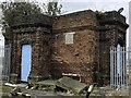 Derelict structure at side of locks