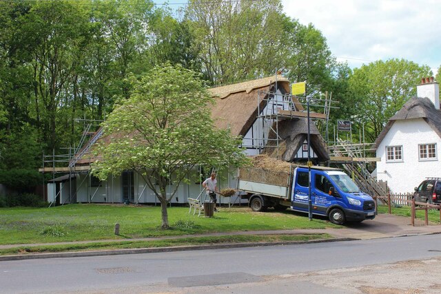 Thatching in progress, the Village Hall, Madingley