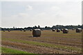 TQ6448 : Bales in a field by N Chadwick