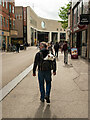 Oxford : man with dog approaching Westgate Shopping Centre