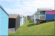 TR1167 : View between two rows of beach huts from Tankerton Slopes by Robert Lamb