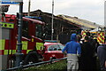 View of a fire-damaged warehouse in Whitstable Harbour