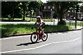 View of a cyclist in the RideLondon Festival from Broadmead Road