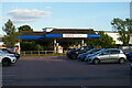 SP8776 : Car park and petrol station, Tesco Superstore, Kettering by Christopher Hilton