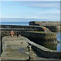 NJ5866 : Portsoy, intersecting harbour piers by Alan Murray-Rust