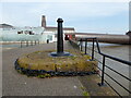 A crane base and the Woodside ferry terminal