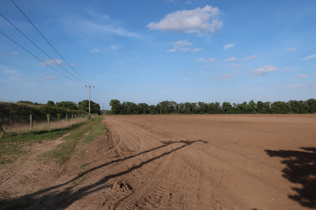 Track past farm reservoir