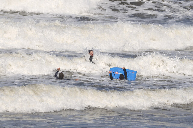 Surfers in the Sea at Sandsend
