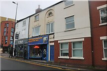 SK5319 : Shops on Leicester Road, Loughborough by David Howard