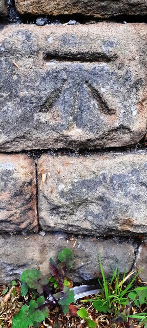 Benchmark on stone in wall on SW side of Porchester Road opposite #288