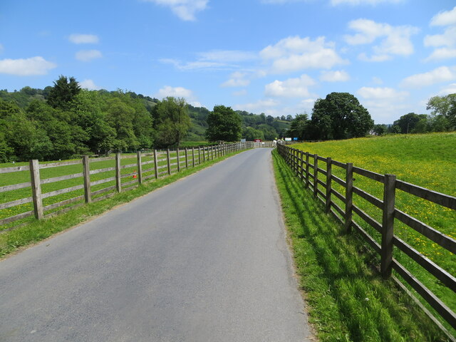 Fence enclosed minor road at Bewerley