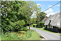 Pond and thatched barn at Baconend Green