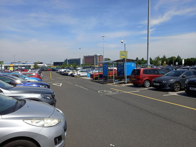 Cars and a bus shelter on B'ham Airport no 5 carpark