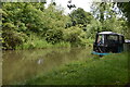 Boat moored on a bend of the Grand Union Canal at Simpson