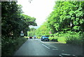 Carnon Downs village sign on the A39