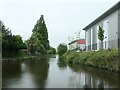 Two canalside retail showrooms, off the A452 Chester Road