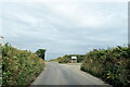 SW5431 : Passing the entrance to Trevarthian Farms near St Hilary by Roy Hughes