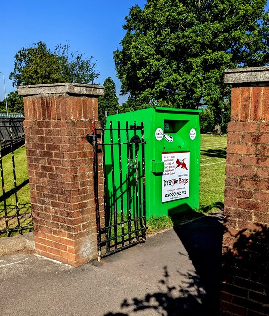 Vivid green bin at a school entrance, Malpas, Newport