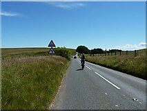 SO1184 : Approaching the cattle grid and junction at Crugynnau by Richard Law